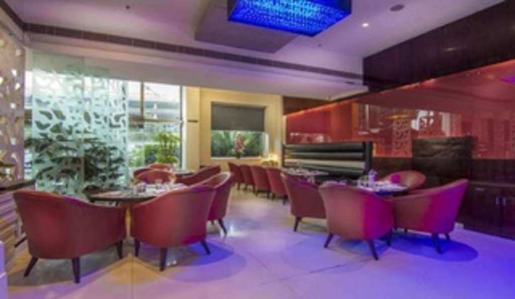 Nemesia City Center - Gurugram, Sector 29 Hotell Gurgaon Restaurant bilde